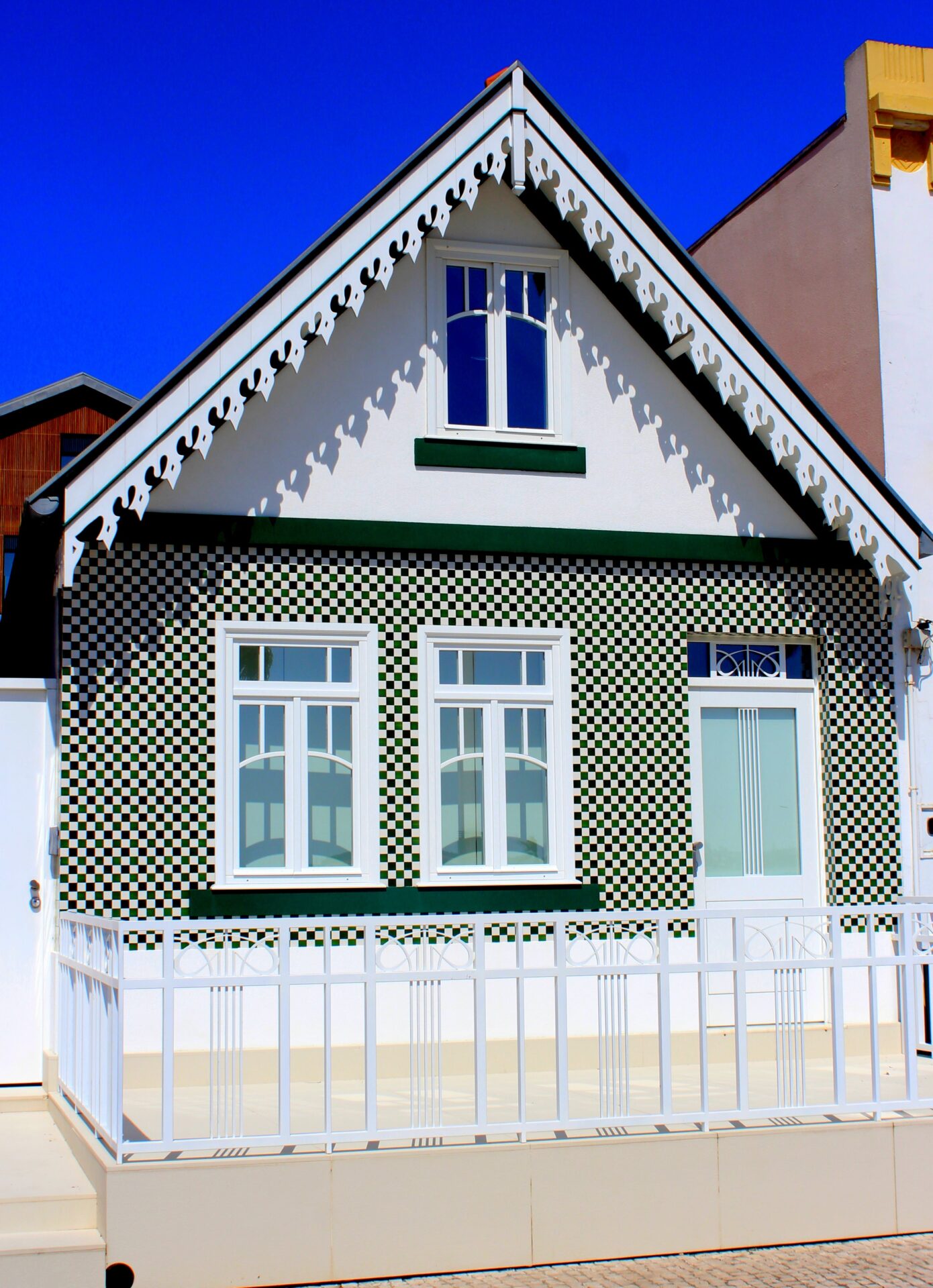 Casa en color verde de Costa Nova